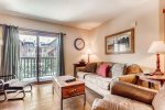 Open and bright living room in a platinum-rated 1 bedroom condo in River Run